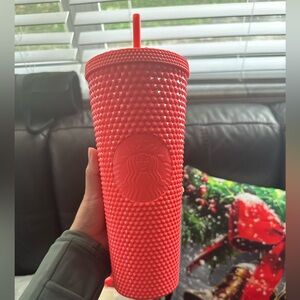 Pink studded starbucks cup